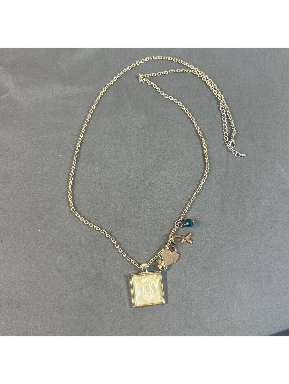 Green Lucky Pendant Necklace With Gold Charms